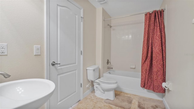 3862 Tristram Loop, Land O Lakes, FL 34638 - full bathroom with a sink, shower / bath combination with curtain, toilet, tile patterned flooring, and baseboards