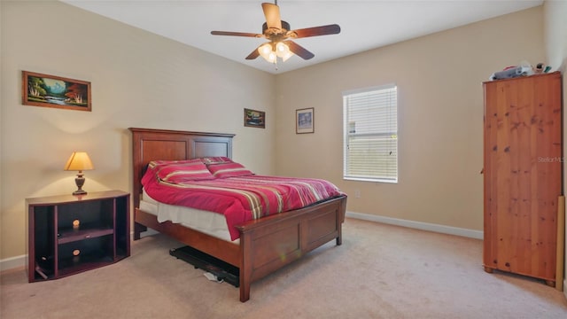 3862 Tristram Loop, Land O Lakes, FL 34638 - bedroom with light carpet, baseboards, and ceiling fan