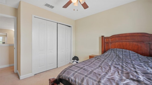 3862 Tristram Loop, Land O Lakes, FL 34638 - bedroom featuring light carpet, a closet, baseboards, and a ceiling fan
