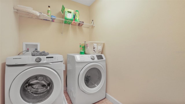 3862 Tristram Loop, Land O Lakes, FL 34638 - laundry room with washing machine and dryer and baseboards