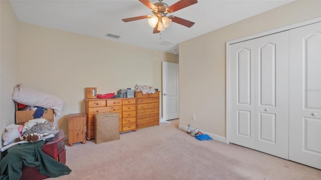 3862 Tristram Loop, Land O Lakes, FL 34638 - carpeted bedroom featuring a closet, a ceiling fan, and baseboards