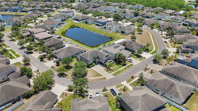 3862 Tristram Loop, Land O Lakes, FL 34638 - aerial overview of property's location with nearby suburban area and a large body of water