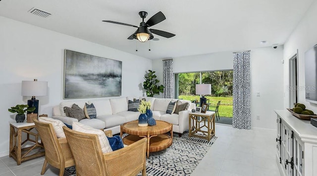 12469 Gust Ct, Hudson, FL 34669 - living room with a ceiling fan and baseboards