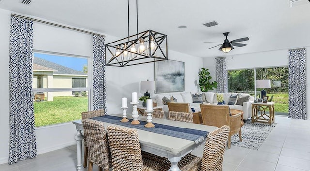 12469 Gust Ct, Hudson, FL 34669 - tiled dining area with ceiling fan