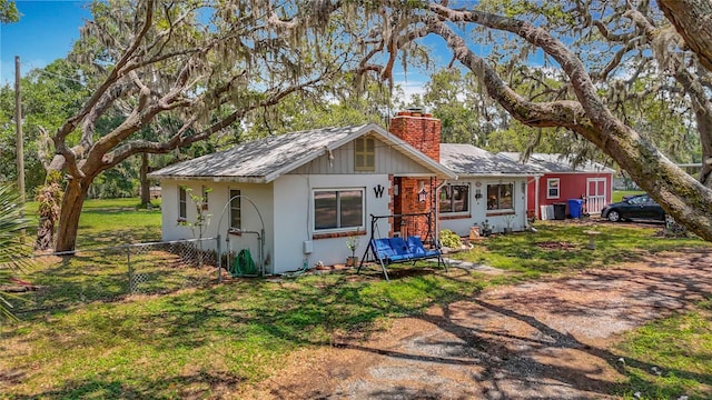 11912 Mcmullen Loop, Riverview, FL 33569 - view of front of house featuring a chimney