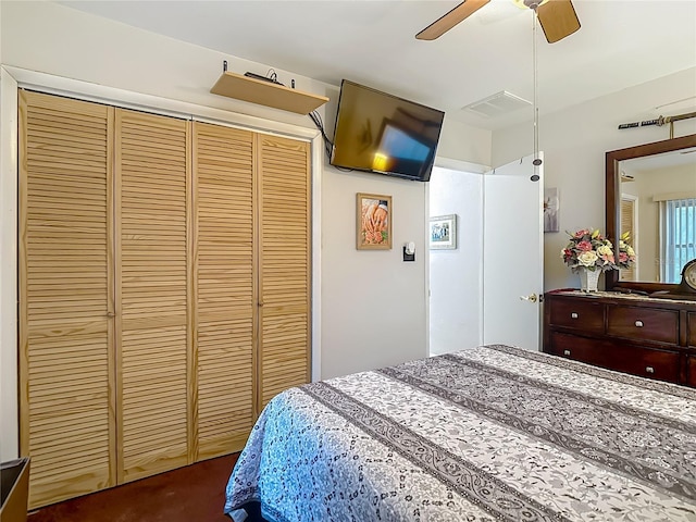 11912 Mcmullen Loop, Riverview, FL 33569 - bedroom with a closet, ceiling fan, and dark carpet