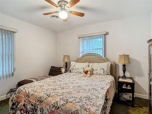 11912 Mcmullen Loop, Riverview, FL 33569 - bedroom with dark colored carpet, baseboards, and ceiling fan
