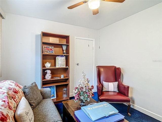 11912 Mcmullen Loop, Riverview, FL 33569 - living area with a ceiling fan, baseboards, and carpet floors