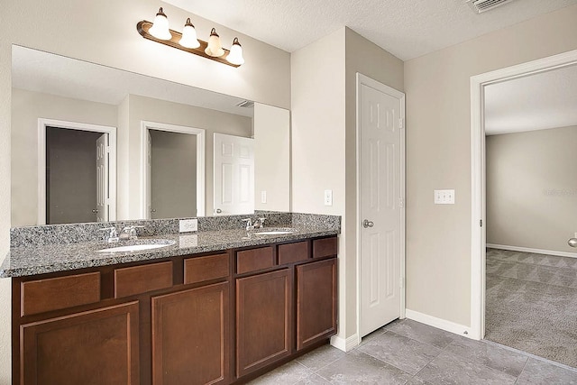 16016 Persimmon Grove Dr, Lithia, FL 33547 - full bath with double vanity and baseboards