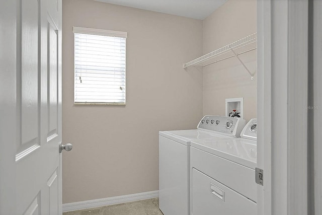 16016 Persimmon Grove Dr, Lithia, FL 33547 - washroom with washing machine and dryer and baseboards
