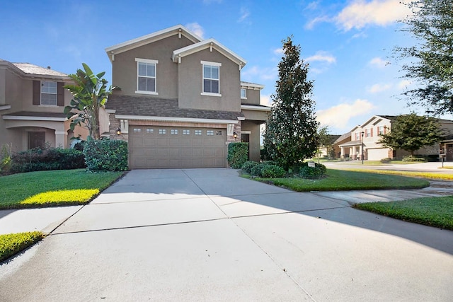 16016 Persimmon Grove Dr, Lithia, FL 33547 - traditional home featuring stucco siding, stone siding, driveway, a garage, and a front lawn