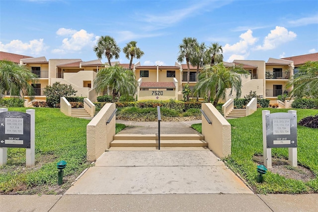 7520 Sunshine Skyway Ln S Unit 109, Saint Petersburg, FL 33711 - view of home's community featuring a residential view and a yard