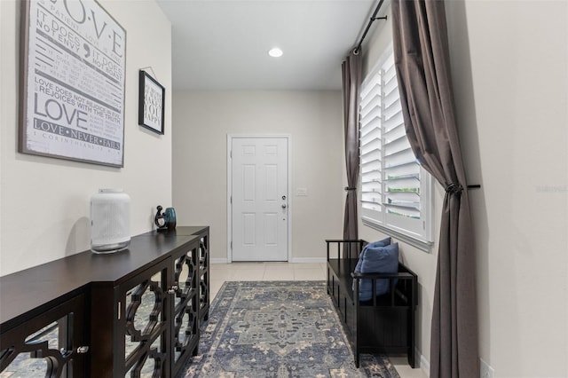 1321 Custer Bayou St, Ruskin, FL 33570 - foyer entrance with healthy amount of natural light, light tile patterned floors, baseboards, and recessed lighting