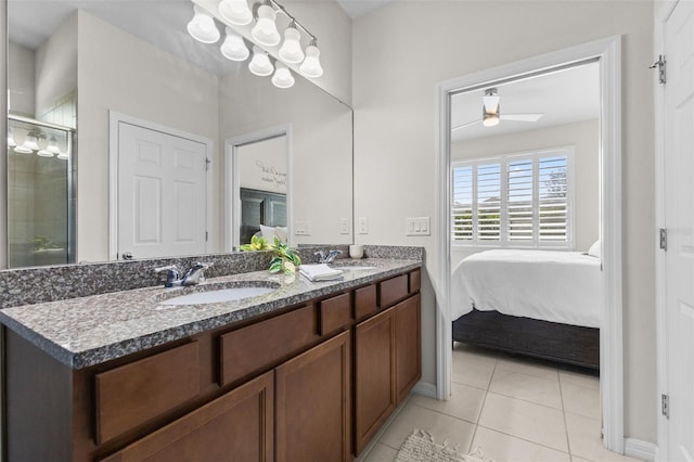 1321 Custer Bayou St, Ruskin, FL 33570 - full bathroom featuring connected bathroom, double vanity, tile patterned floors, and a stall shower