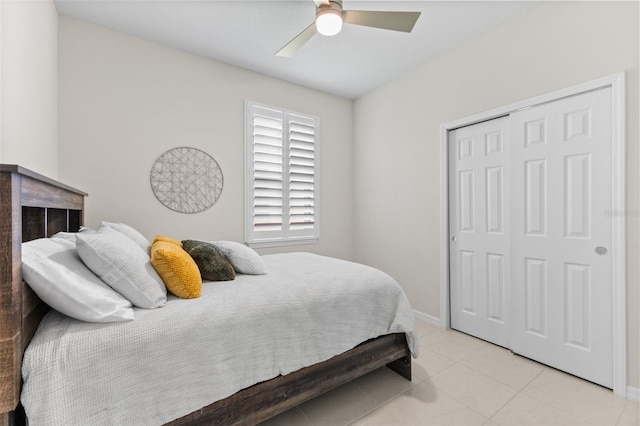 1321 Custer Bayou St, Ruskin, FL 33570 - bedroom with a closet, baseboards, light tile patterned floors, and ceiling fan