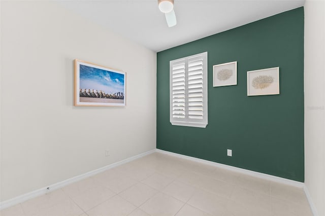 1321 Custer Bayou St, Ruskin, FL 33570 - tiled empty room with a ceiling fan and baseboards
