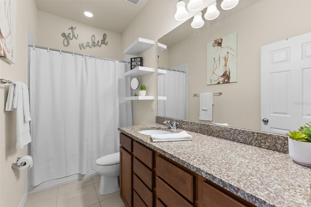 1321 Custer Bayou St, Ruskin, FL 33570 - full bath featuring toilet, vanity, and tile patterned flooring