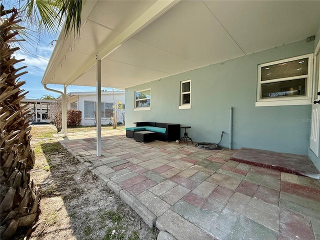440 89th Ave, St Pete Beach, FL 33706 - view of patio with an outdoor hangout area