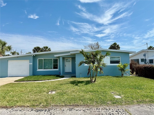 440 89th Ave, St Pete Beach, FL 33706 - ranch-style house with an attached garage, a front yard, driveway, and stucco siding