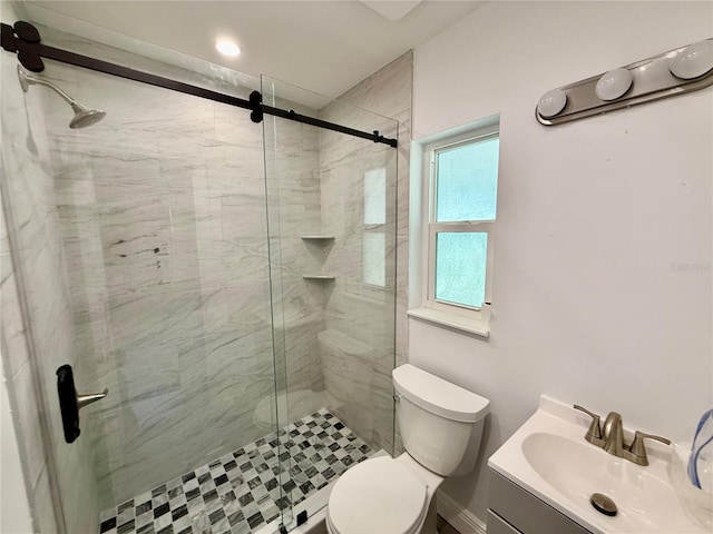 440 89th Ave, St Pete Beach, FL 33706 - bathroom featuring toilet, a stall shower, and vanity