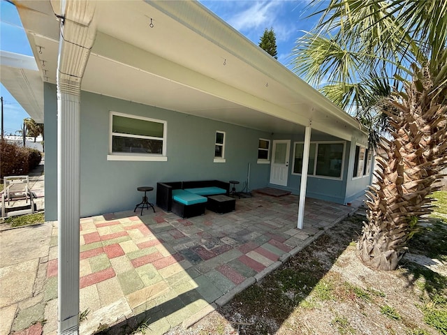 440 89th Ave, St Pete Beach, FL 33706 - view of patio with outdoor lounge area