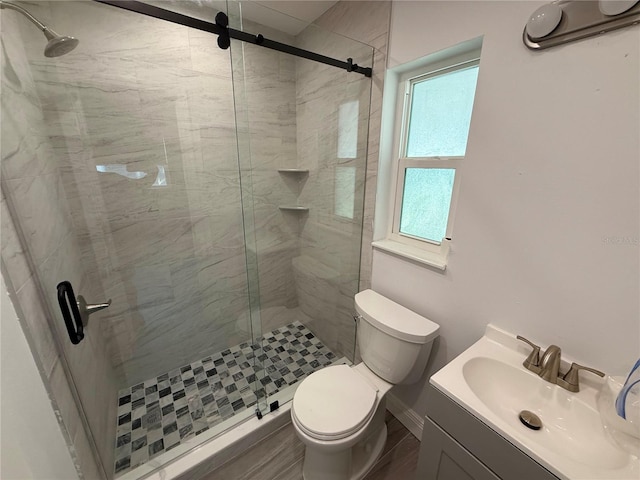 440 89th Ave, St Pete Beach, FL 33706 - full bathroom featuring a stall shower, toilet, and vanity