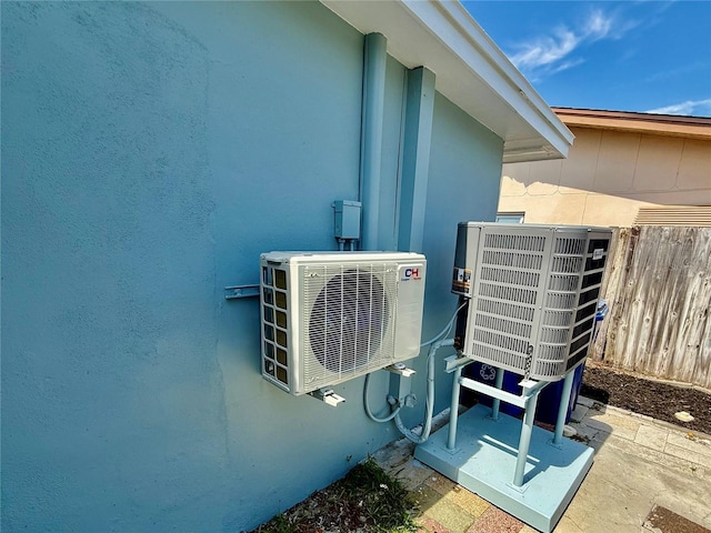 440 89th Ave, St Pete Beach, FL 33706 - exterior view of ac unit, central AC unit, and stucco siding
