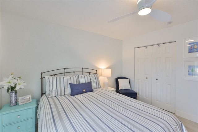 230 Medallion Blvd Unit F, Madeira Beach, FL 33708 - bedroom featuring a closet, ceiling fan, and baseboards