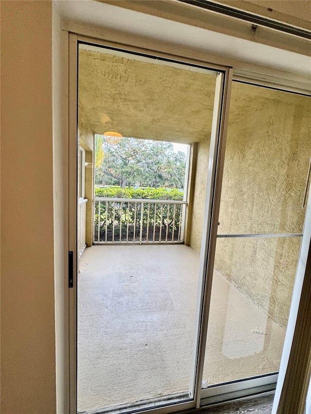 2690 Coral Landings Blvd Unit 217, Palm Harbor, FL 34684 - entryway featuring carpet floors