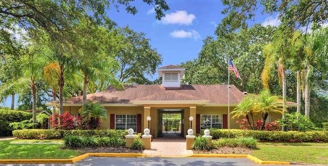 2690 Coral Landings Blvd Unit 217, Palm Harbor, FL 34684 - view of property featuring uncovered parking