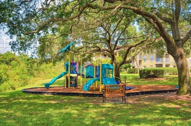2690 Coral Landings Blvd Unit 217, Palm Harbor, FL 34684 - community playground featuring a lawn