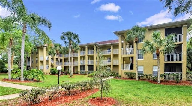 2690 Coral Landings Blvd Unit 217, Palm Harbor, FL 34684 - view of apartment building / complex