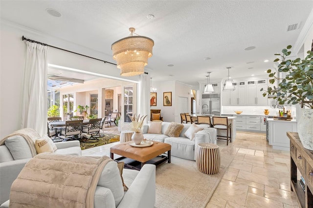 703 Monte Cristo Blvd, Tierra Verde, FL 33715 - living area featuring crown molding