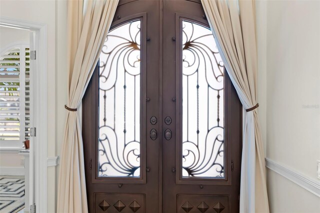 703 Monte Cristo Blvd, Tierra Verde, FL 33715 - foyer entrance with french doors
