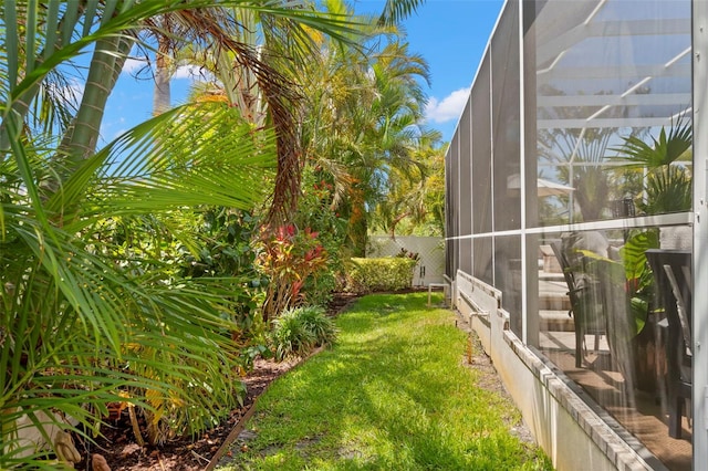 703 Monte Cristo Blvd, Tierra Verde, FL 33715 - view of yard featuring a lanai