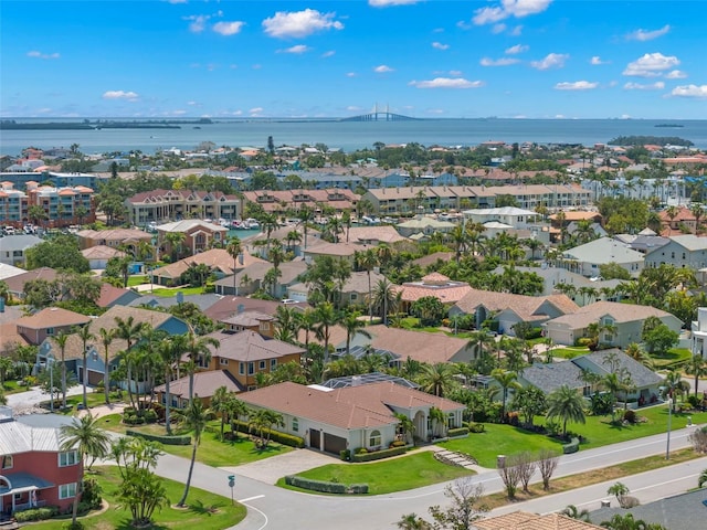 703 Monte Cristo Blvd, Tierra Verde, FL 33715 - aerial view of residential area featuring a large body of water and a notable bridge