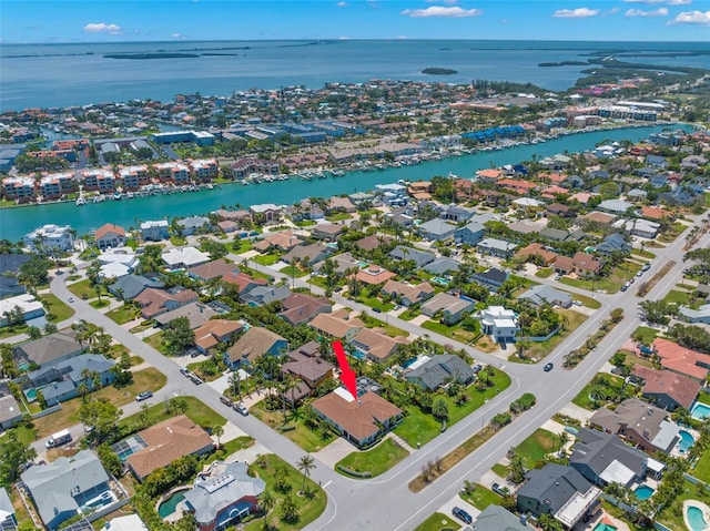 703 Monte Cristo Blvd, Tierra Verde, FL 33715 - aerial overview of property's location with a nearby body of water and nearby suburban area