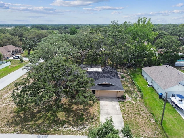 2410 Covington Ave, Spring Hill, FL 34608 - view of subject property with a heavily wooded area