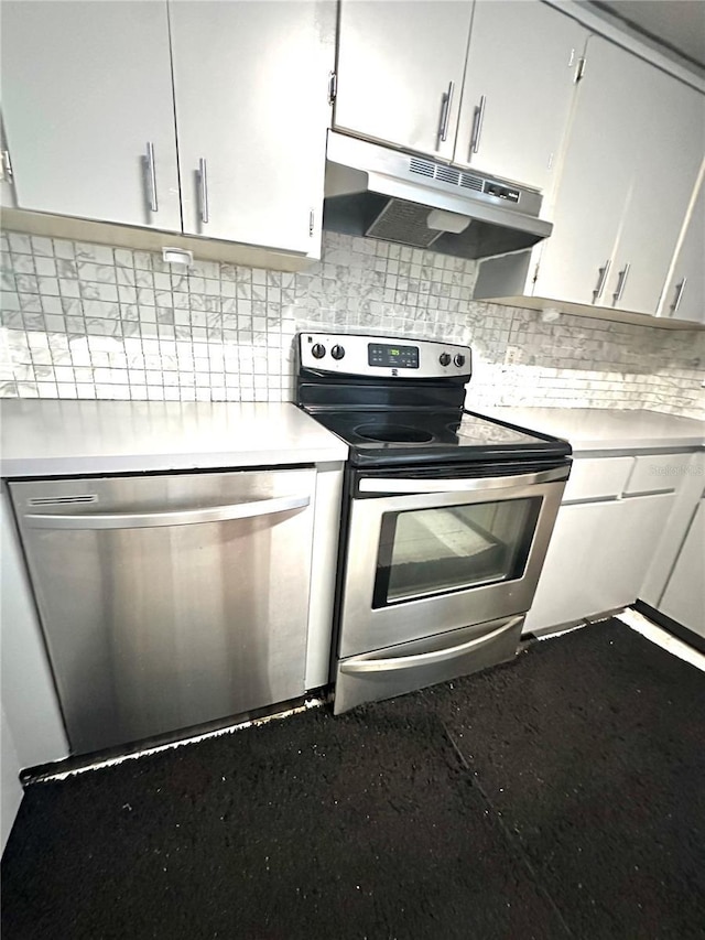 13100 Serpentine Dr, Hudson, FL 34667 - kitchen featuring stainless steel appliances, under cabinet range hood, light countertops, decorative backsplash, and white cabinets