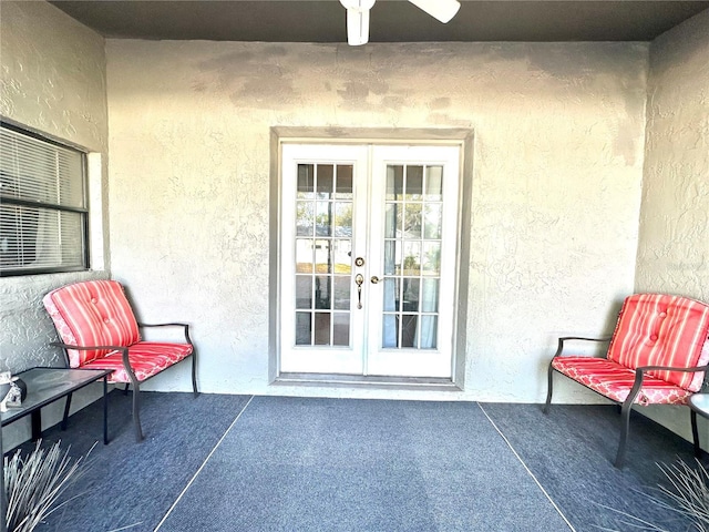 13100 Serpentine Dr, Hudson, FL 34667 - property entrance with french doors and stucco siding