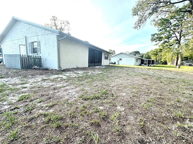 13100 Serpentine Dr, Hudson, FL 34667 - back of property featuring stucco siding