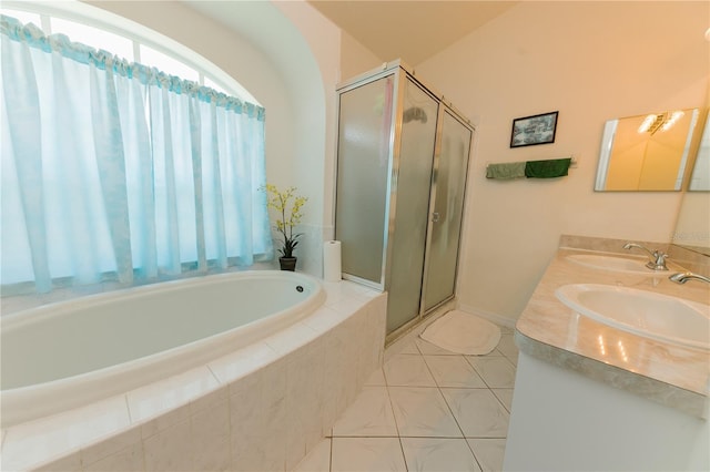 3010 Grand View Ave, Clearwater, FL 33759 - bathroom with a bath, a shower stall, double vanity, and tile patterned floors