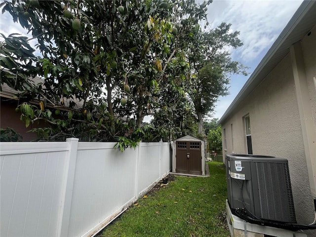 3010 Grand View Ave, Clearwater, FL 33759 - view of yard featuring central AC