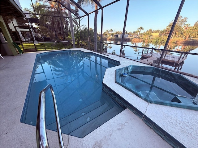 3338 Fernleaf Dr, Hernando Beach, FL 34607 - swimming pool featuring a water view, an in-ground hot tub, and a lanai