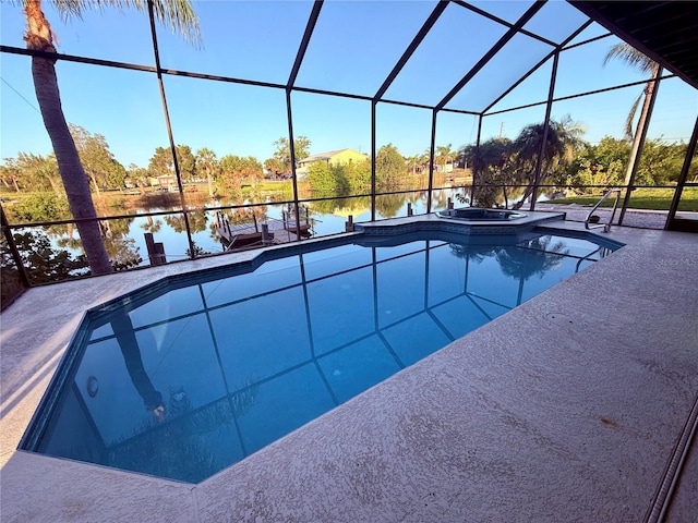 3338 Fernleaf Dr, Hernando Beach, FL 34607 - view of pool featuring a water view, a lanai, a pool with connected hot tub, and a patio area