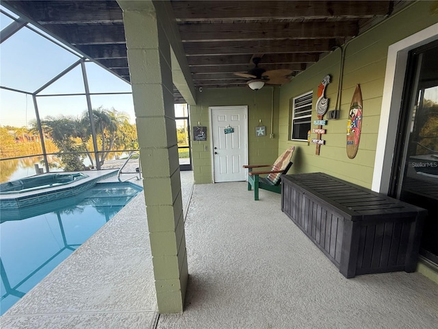 3338 Fernleaf Dr, Hernando Beach, FL 34607 - outdoor pool with an in-ground hot tub, a lanai, and a ceiling fan