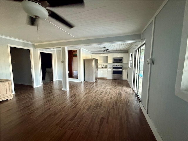 3338 Fernleaf Dr, Hernando Beach, FL 34607 - unfurnished living room featuring ceiling fan, dark wood finished floors, a sink, and ornamental molding