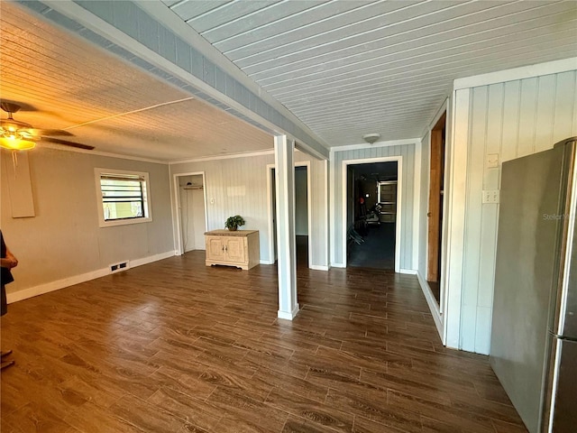 3338 Fernleaf Dr, Hernando Beach, FL 34607 - unfurnished living room featuring ceiling fan, dark wood finished floors, and ornamental molding