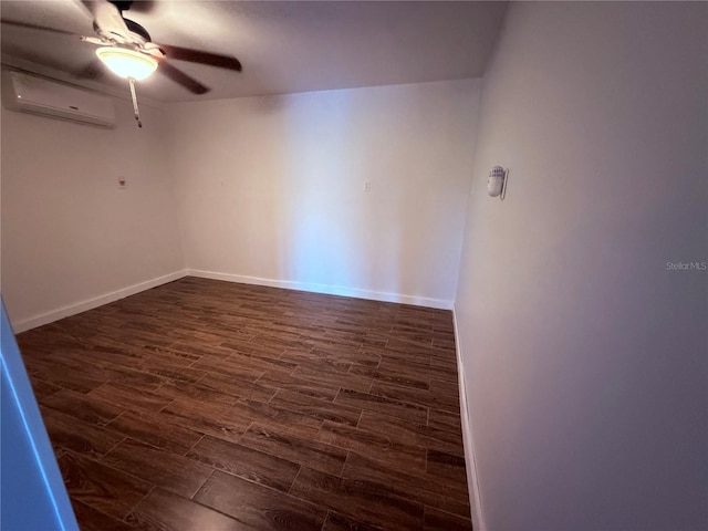 3338 Fernleaf Dr, Hernando Beach, FL 34607 - unfurnished room featuring a wall mounted AC, ceiling fan, dark wood finished floors, and baseboards