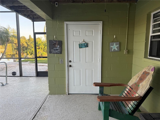 3338 Fernleaf Dr, Hernando Beach, FL 34607 - property entrance featuring concrete block siding
